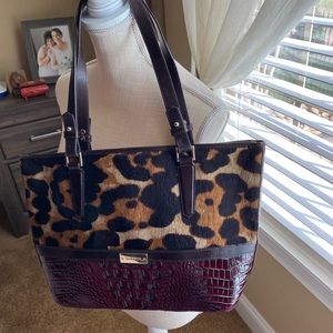 Brahmin purse. The color is eggplant with a cheetah print.